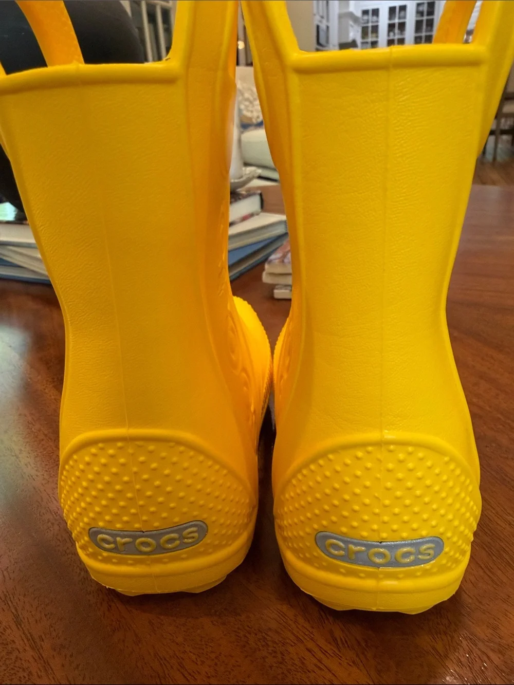 Crocs Kids' Handle It Rain Boots in vibrant yellow. Size 8